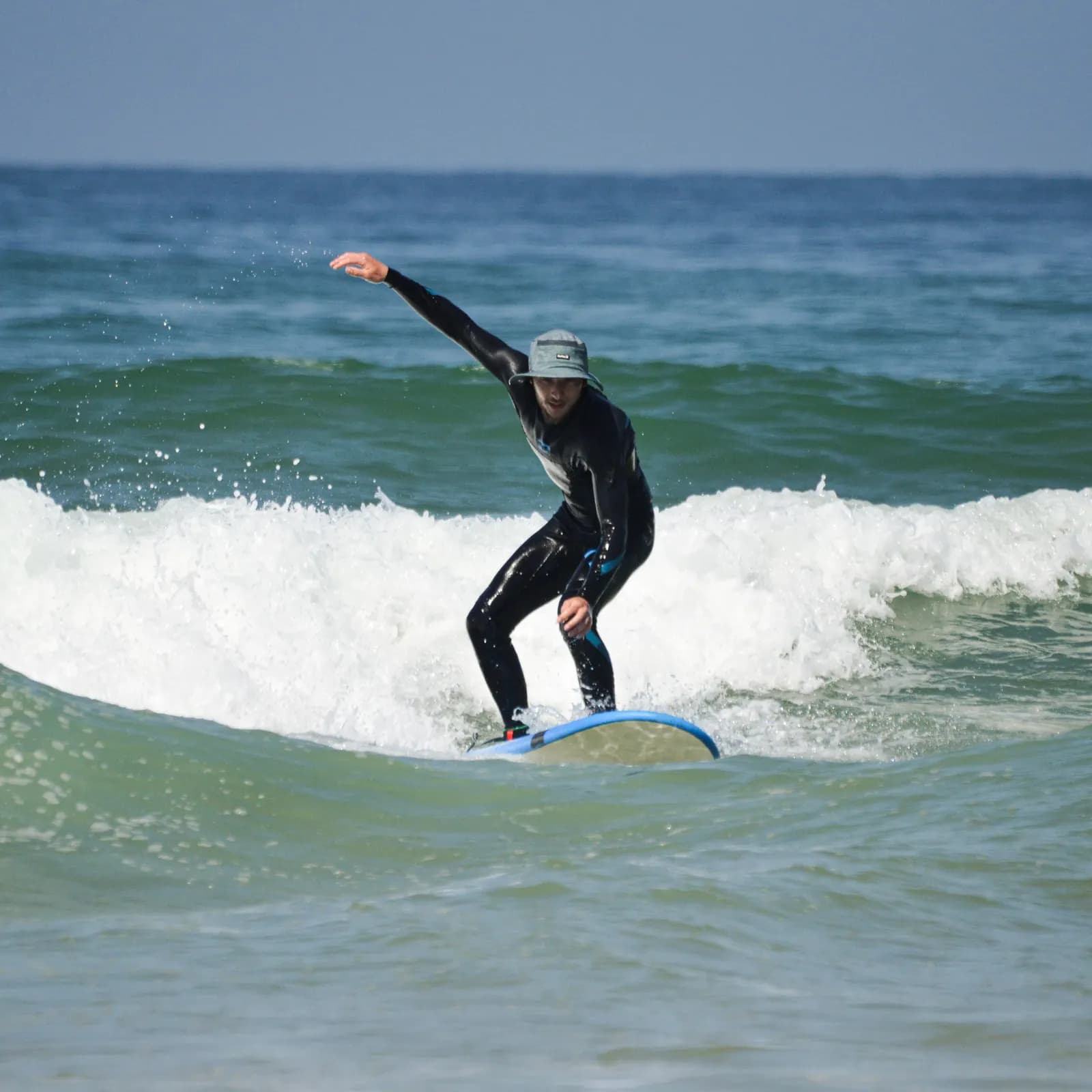 A surfer riding a wave
